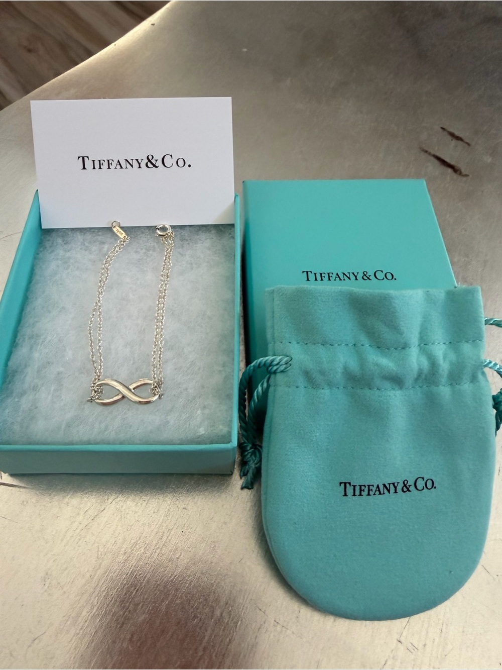 NEW Tiffany & Co. Silver Infinity Bracelet with Signature Blue Pouch